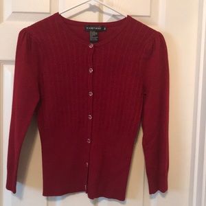 Small light sweater. Maroon color.